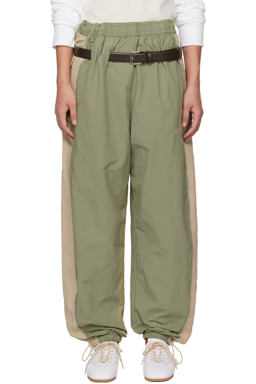 Nylon canvas and viscose-blend cady track pants.

· Paneled construction
· Concealed drawstring at elasticized waistband
· Cutout at waistband
· Detachable leather pin-buckle belt
· Two-pocket styling
· Logo embroidered at front
· Bungee-style drawstring at cuffs
· Silver-tone hardware

Supplier color: Sage