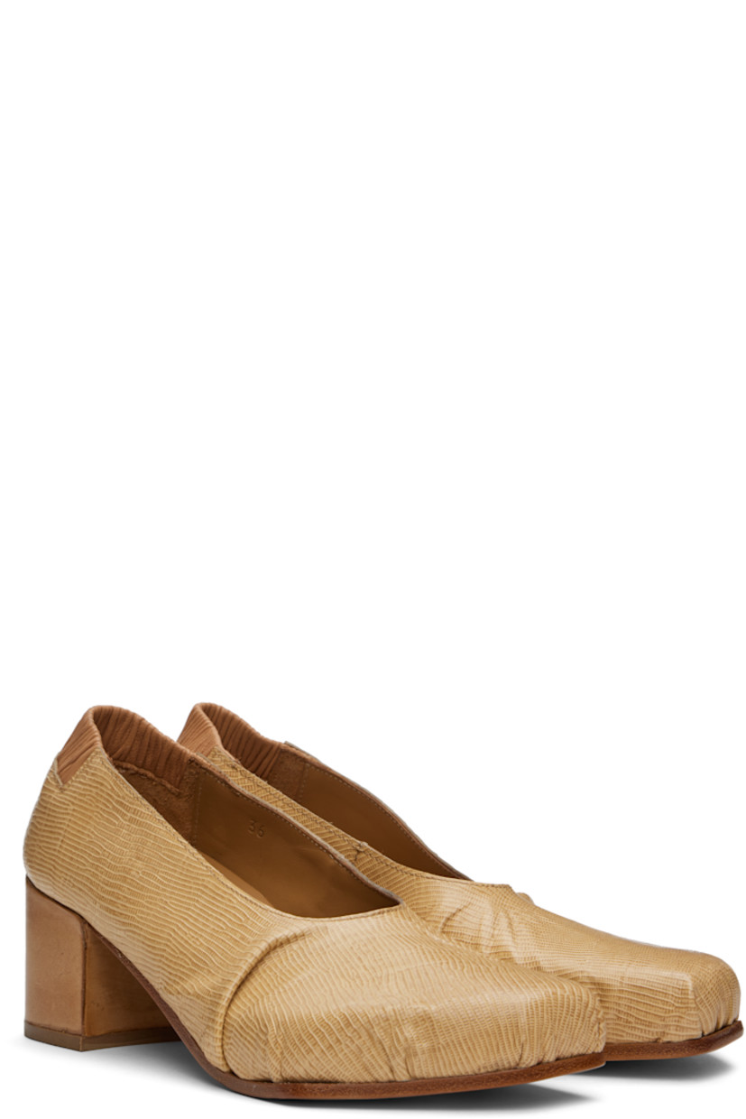 Lizard-embossed leather heels in beige.

· Gathering at square toe and vamp
· Elasticized heel collar
· Suede and buffed leather lining
· Block heel with rubber injection
· Leather sole
· Heel: H2.25"

Supplier color: Beige
