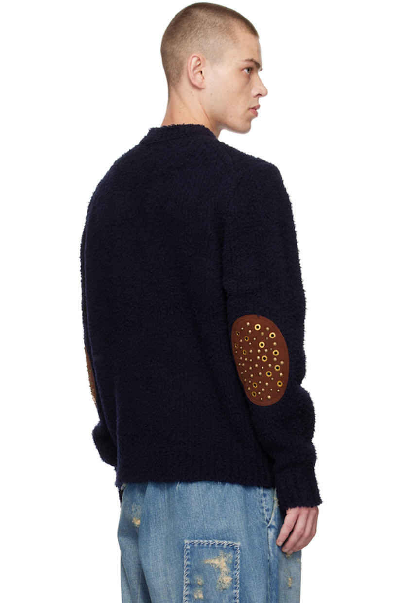 Brushed knit wool-blend sweater.

· Crewneck
· Studded patch at elbows
 
Supplier color: E-Navy