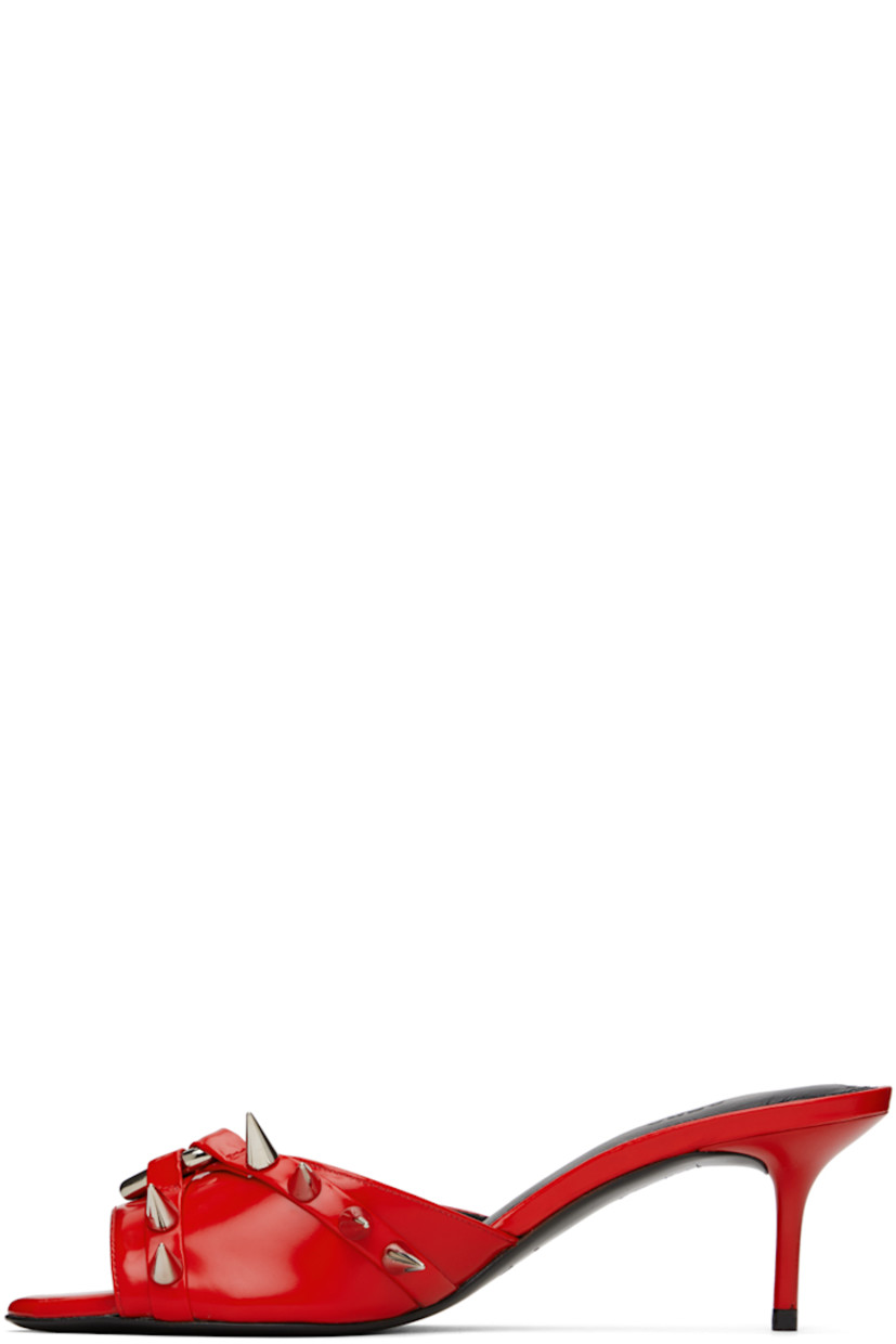 Polished leather heeled sandals in red.

· Open toe
· Spikes and graphic hardware at vamp
· Logo embossed at padded footbed
· Covered kitten heel with rubber injection
· Leather sole
· Heel: H2.5"

Supplier color: Red