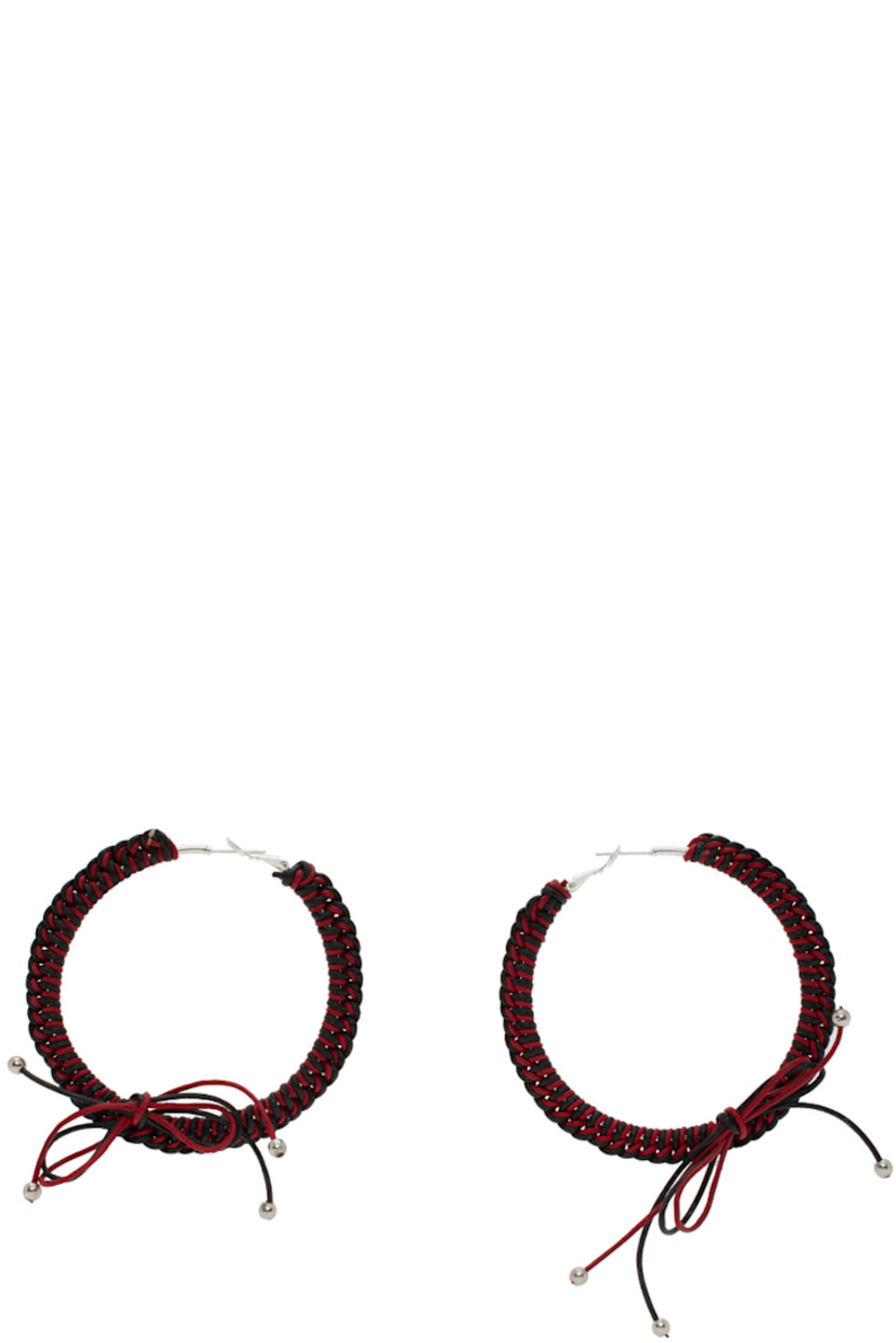 Pair of hoop earrings in sterling silver. Braided leather cord in black and red throughout.

· Bow accent at drop
· Hinged-post fastening
· D2.5"

Supplier color: Black/Red