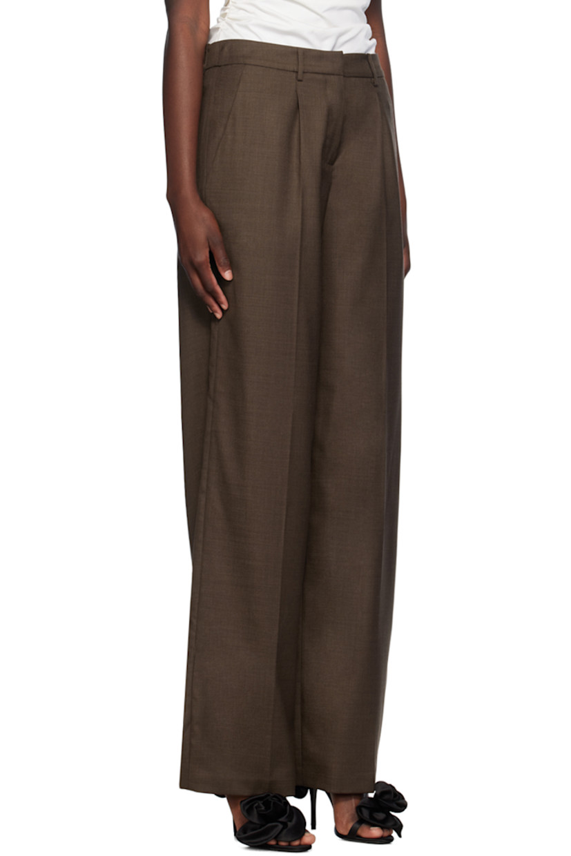 Wide-leg flared worsted stretch wool delaine trousers.

· Belt loops
· Four-pocket styling
· Zip-fly
· Pleats at front
· Creased legs

Supplier color: Brown