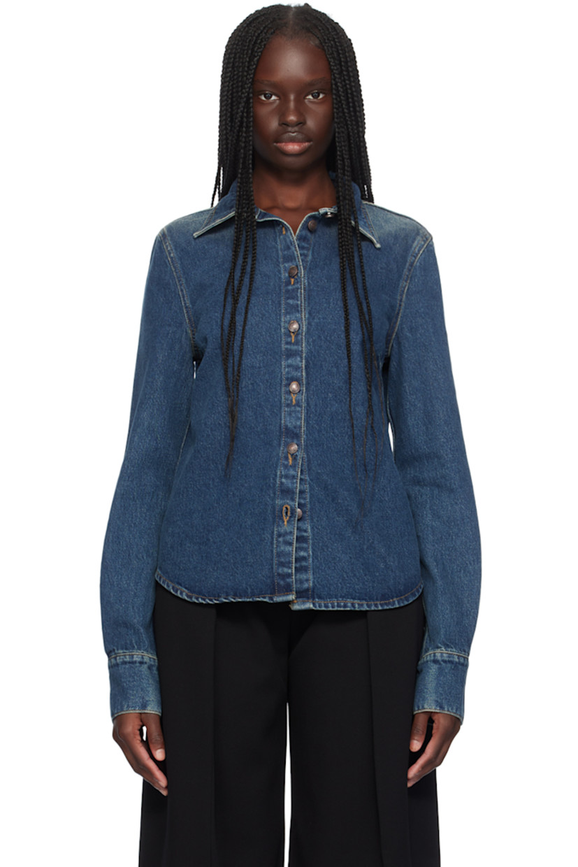 Non-stretch denim shirt. Fading throughout. 

· Spread collar
· Button closure
· Single-button barrel cuffs
· Logo-engraved antiqued copper-tone hardware
· Contrast stitching in tan 

Supplier color: Navy