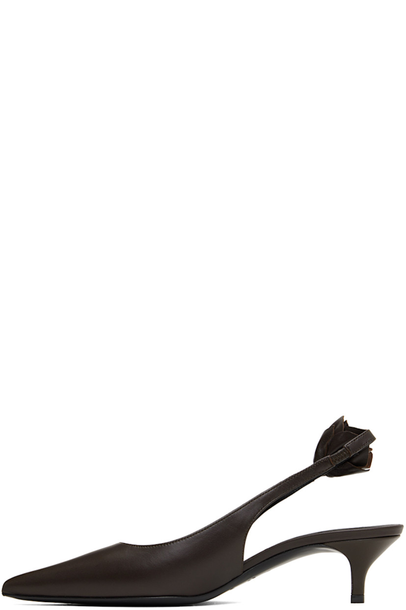 Buffed nappa leather heels in brown. 

· Pointed toe
· Floral accent at partially elasticized slingback strap
· Logo embossed at padded footbed
· Covered kitten heel with rubber injection
· Calfskin sole
· Heel: H2"

Supplier color: Brown