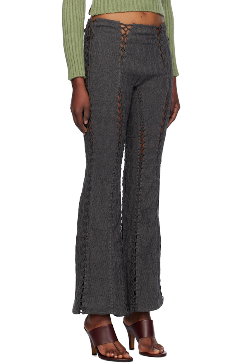Cable-knit cotton lounge pants.

· Flared leg
· Self-tie straps at waistband
· Laddering at front and back
· Lace-up detailing at side seams 

Supplier color: Charcoal