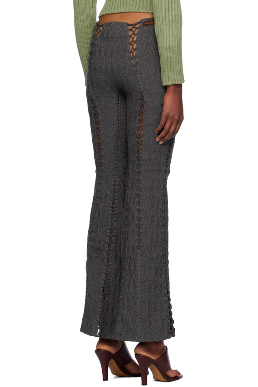 Cable-knit cotton lounge pants.

· Flared leg
· Self-tie straps at waistband
· Laddering at front and back
· Lace-up detailing at side seams 

Supplier color: Charcoal