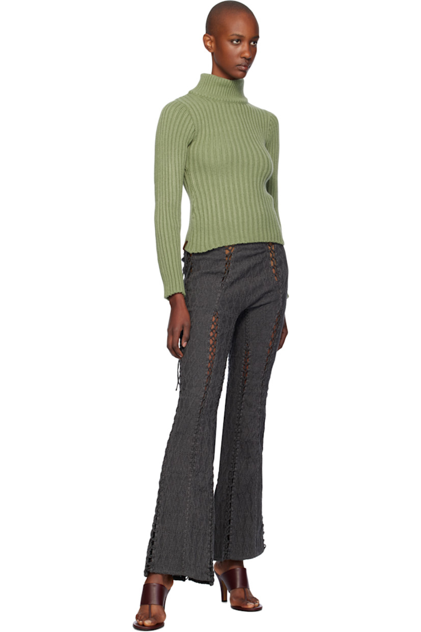 Cable-knit cotton lounge pants.

· Flared leg
· Self-tie straps at waistband
· Laddering at front and back
· Lace-up detailing at side seams 

Supplier color: Charcoal
