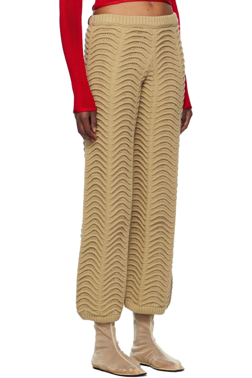 Handcrafted cable-knit acrylic lounge pants. 

· Rib-knit elasticized waistband
· Rib-knit cuffs

Supplier color: Sand