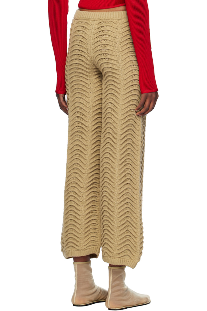 Handcrafted cable-knit acrylic lounge pants. 

· Rib-knit elasticized waistband
· Rib-knit cuffs

Supplier color: Sand