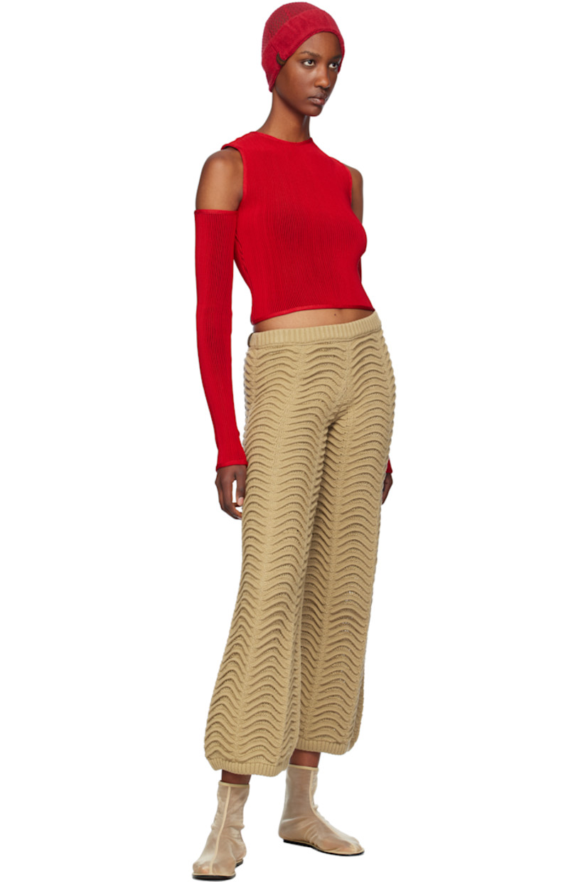 Handcrafted cable-knit acrylic lounge pants. 

· Rib-knit elasticized waistband
· Rib-knit cuffs

Supplier color: Sand