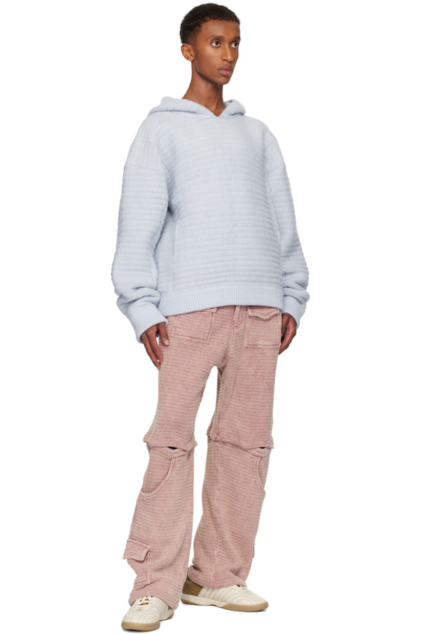 Knit stretch acrylic hoodie.

· Kangaroo pocket
· Rib-knit hem and cuffs
· Logo flag at side seam
· Dropped shoulders

Available exclusively at SSENSE.

Supplier color: Ocean