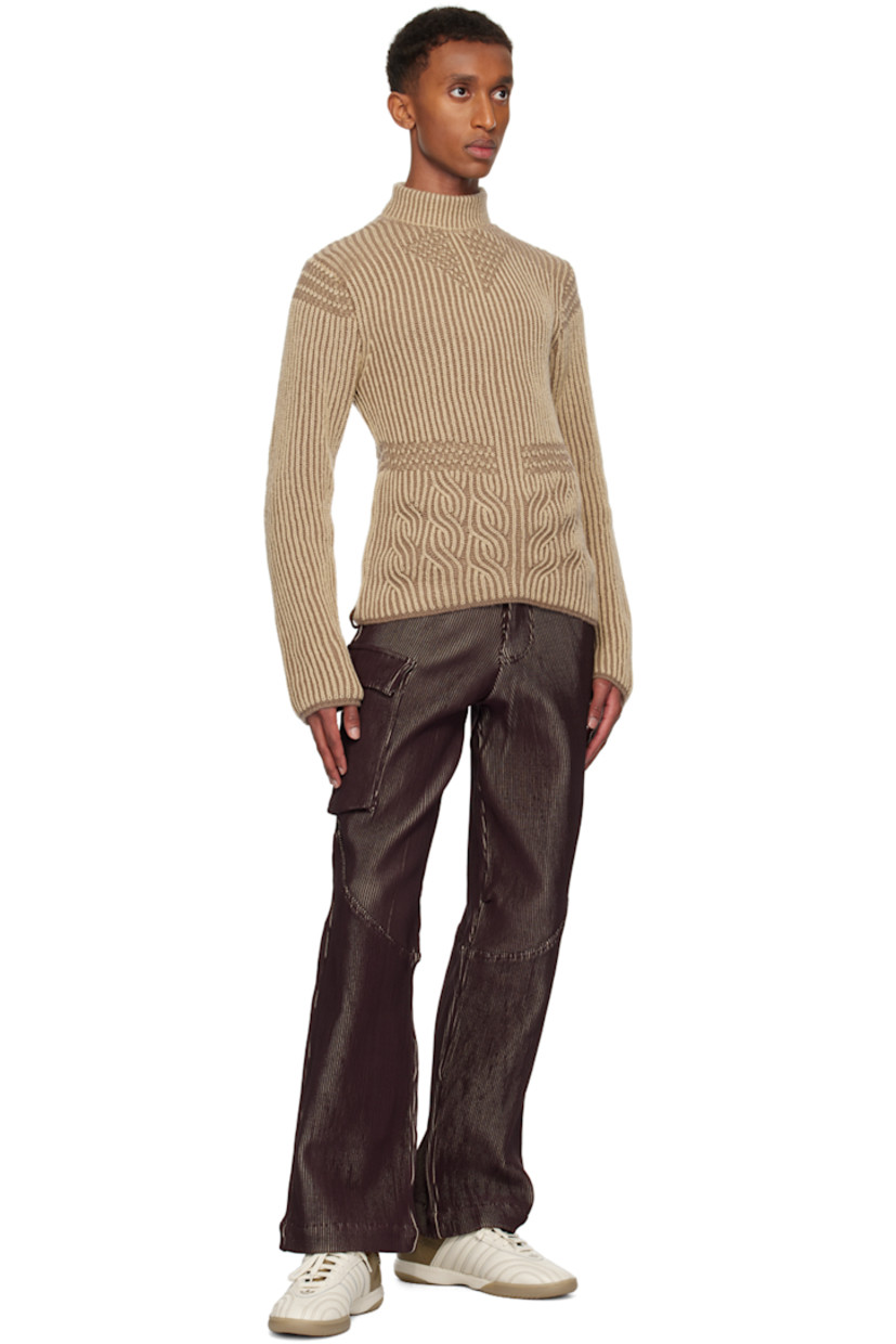 Rib-knit stretch acrylic turtleneck. Logo flag at side seam.

Available exclusively at SSENSE.

Supplier color: Soil