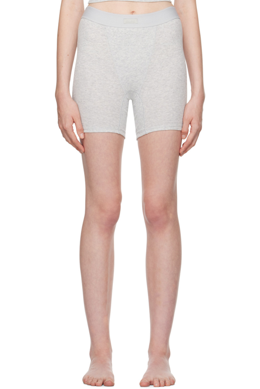 Pack of three breathable stretch cotton ribbed jersey boy shorts.

· Scalloped edge at elasticized waistband
· Logo patch at front waistband

Supplier color: Blue rosebud multi