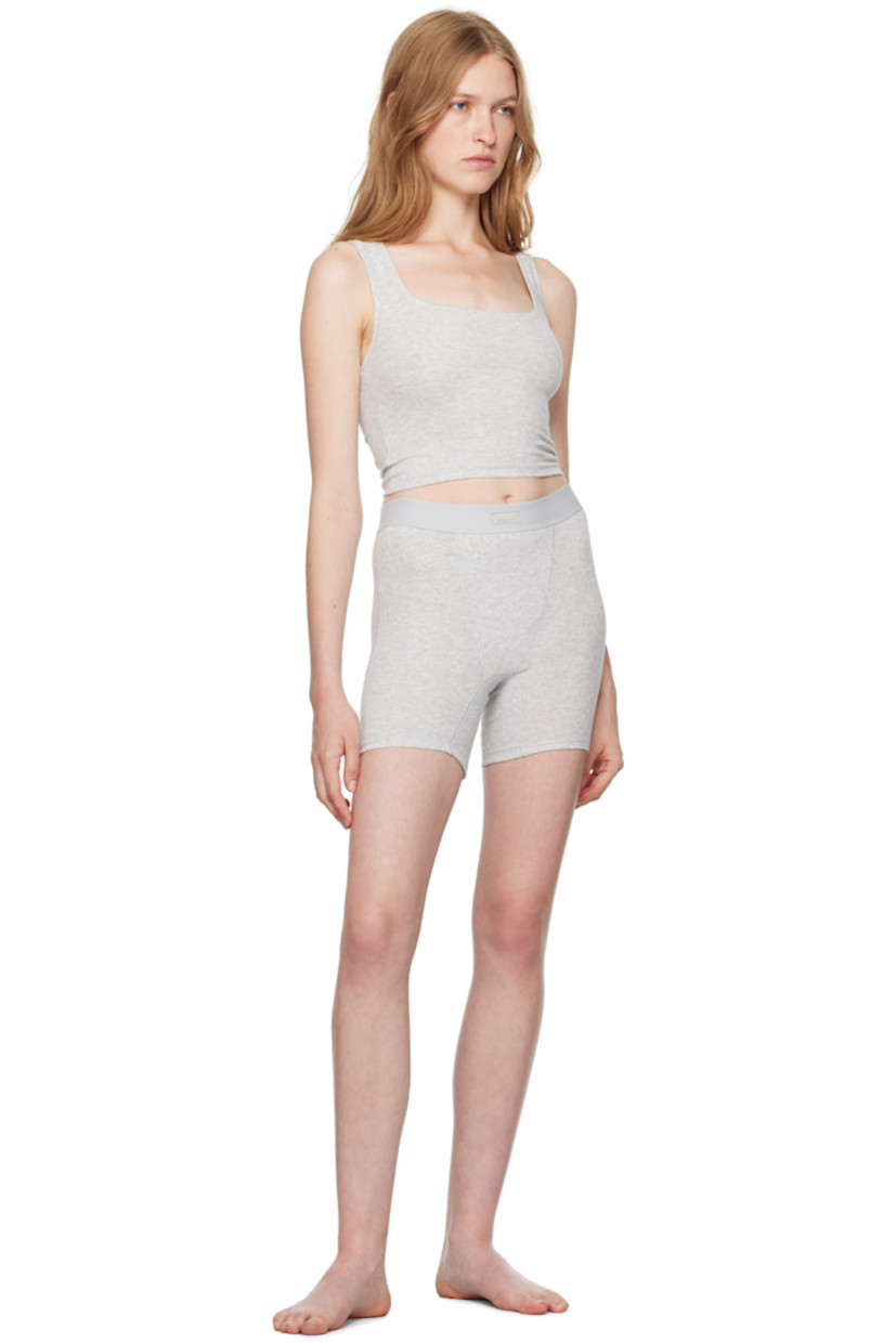 Pack of three breathable stretch cotton ribbed jersey boy shorts.

· Scalloped edge at elasticized waistband
· Logo patch at front waistband

Supplier color: Blue rosebud multi
