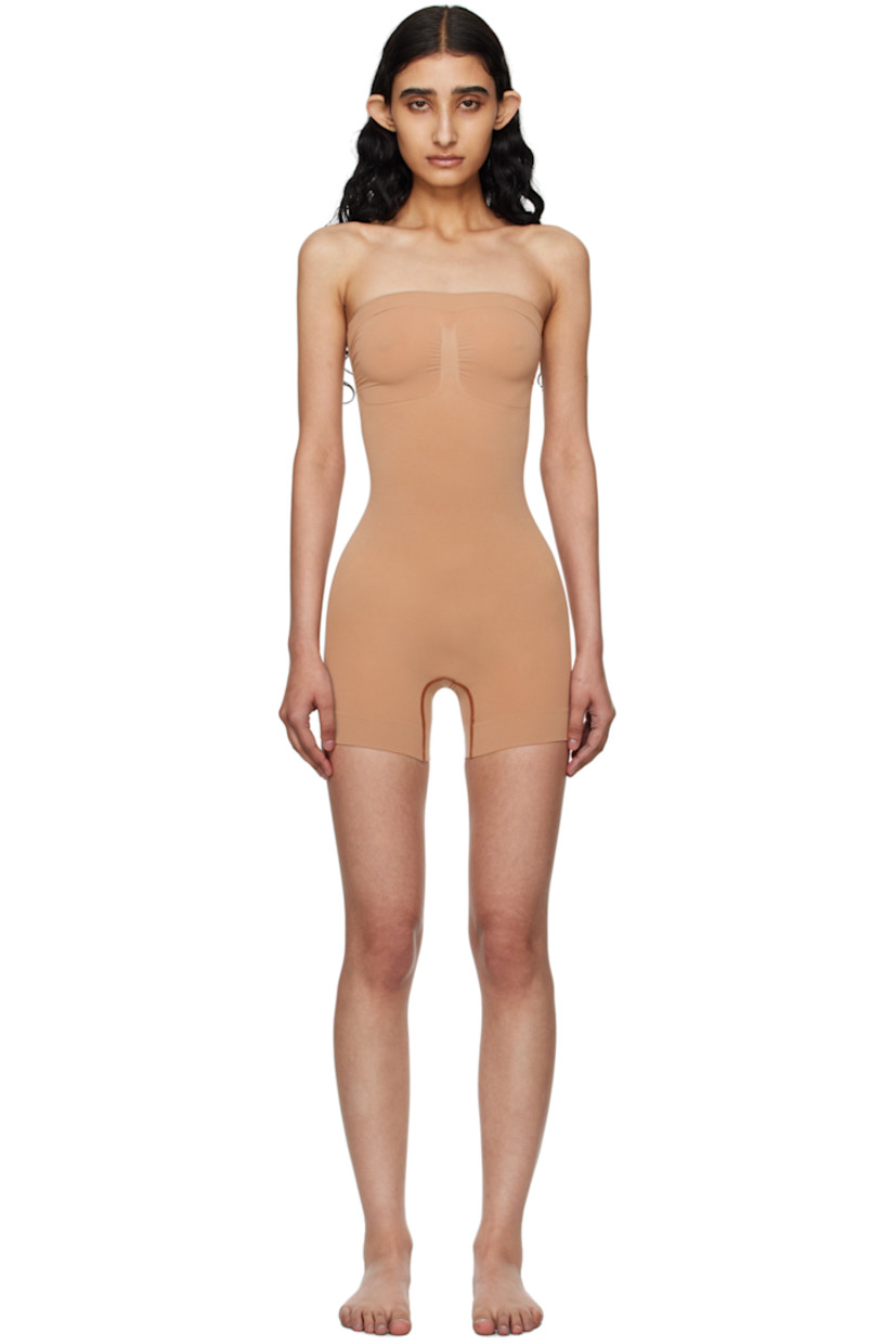 Stretch recycled nylon-blend jersey bodysuit. Includes detachable and adjustable shoulder straps for alternate styling.

· Strapless construction
· Straight neck
· Ruching at front
· Lapped gusset at bottom

Supplier color: Sienna