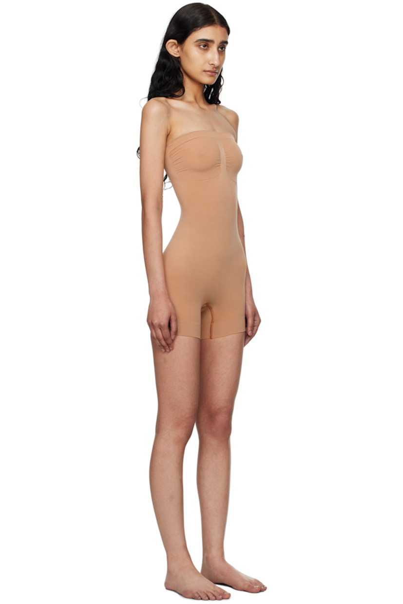 Stretch recycled nylon-blend jersey bodysuit. Includes detachable and adjustable shoulder straps for alternate styling.

· Strapless construction
· Straight neck
· Ruching at front
· Lapped gusset at bottom

Supplier color: Sienna
