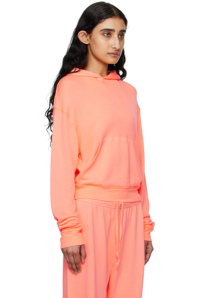 Lightweight French terry hoodie.

· Kangaroo pocket
· Rib knit hem and cuffs
· Dropped shoulders

Supplier color: Neon orange