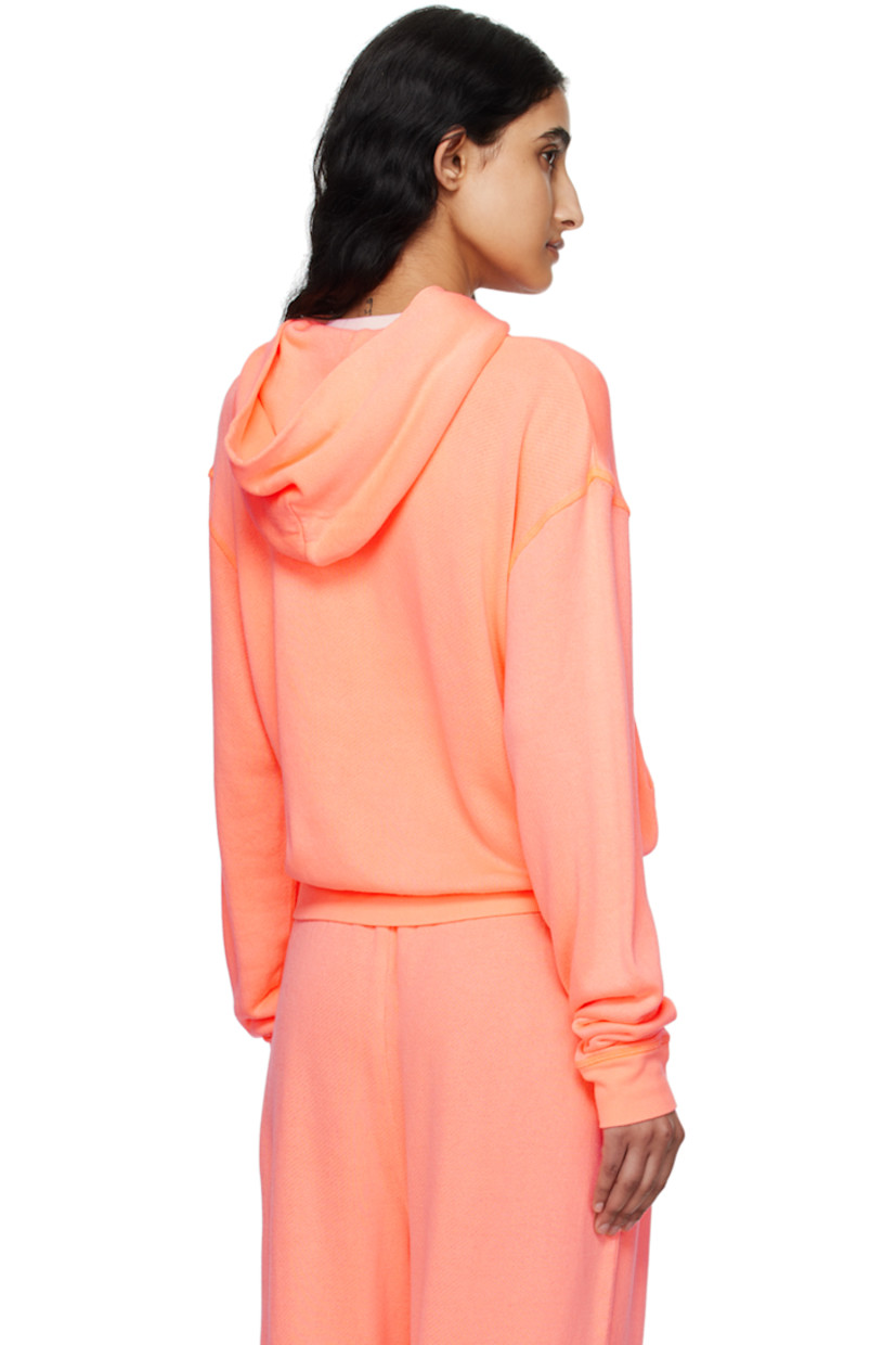 Lightweight French terry hoodie.

· Kangaroo pocket
· Rib knit hem and cuffs
· Dropped shoulders

Supplier color: Neon orange