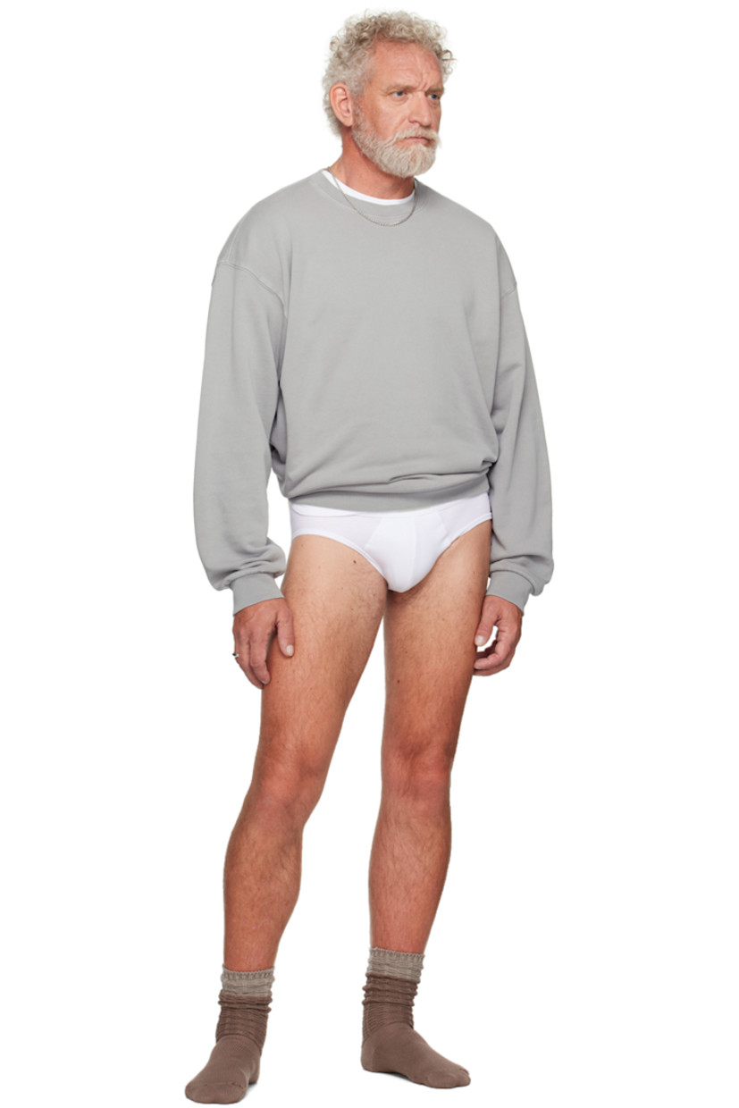 Pack of three stretch cotton- and modal-blend jersey briefs. 

· Logo patch at elasticized waistband 
· Partially lined

Supplier color: Chalk