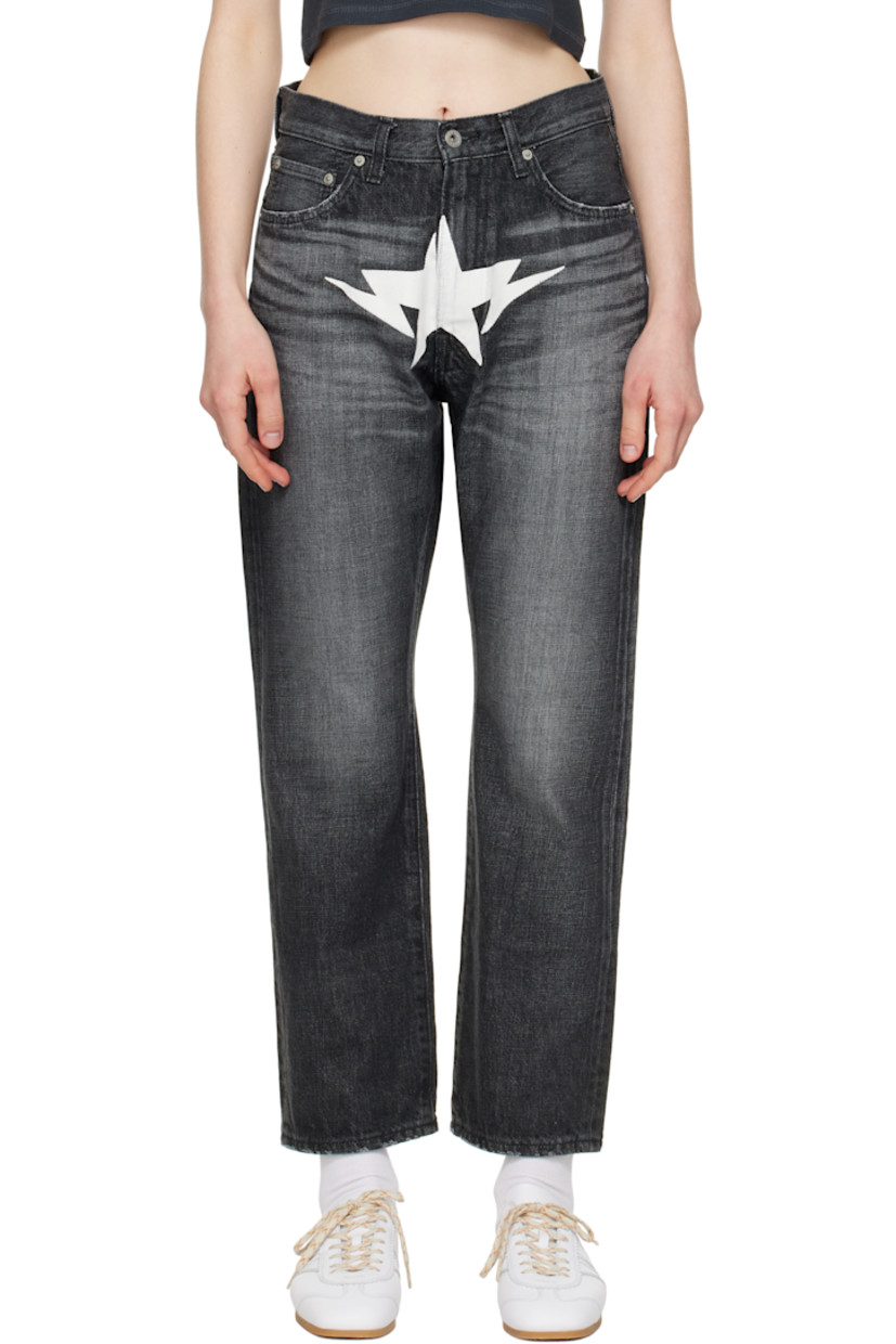 Non-stretch denim jeans. Fading, whiskering, and subtle distressing throughout.

· Belt loops
· Five-pocket styling
· Zip fly
· Graphic printed at front
· Leather logo patch at back waistband
· Logo-engraved silver-tone hardware

Supplier color: Black