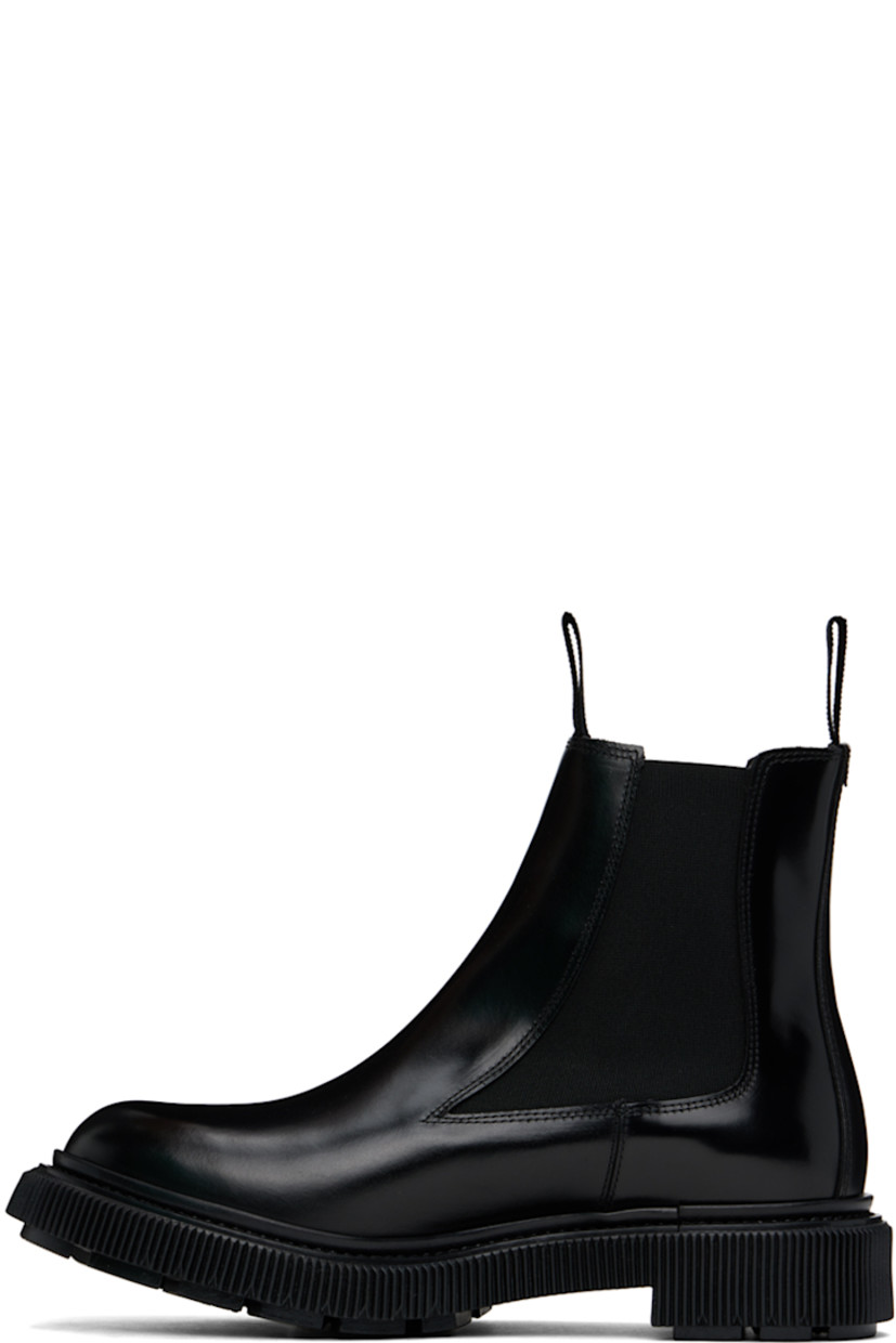 Ankle-high polished leather Chelsea boots in black.

· Elasticized gussets at sides
· Grosgrain pull-loops at collar
· Buffed leather and suede lining 
· Padded leather footbed
· Textured rubber midsole
· Injected treaded rubber sole
· Heel: H1.75"

Supplier color: Black