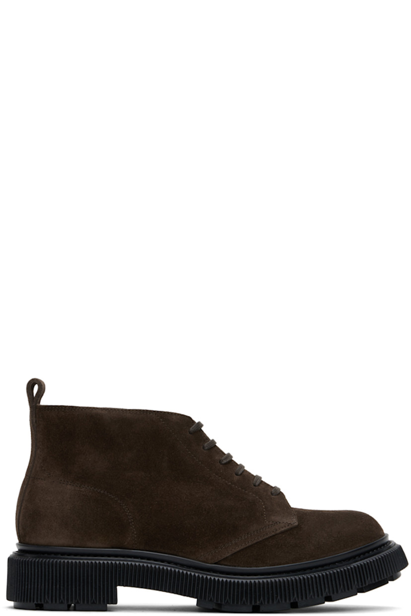 Ankle-high suede boots in brown.

· Lace-up closure
· Pull-loop at heel collar
· Suede lining 
· Topstitching at welt
· Textured rubber sole

Supplier color: Suede dark earth