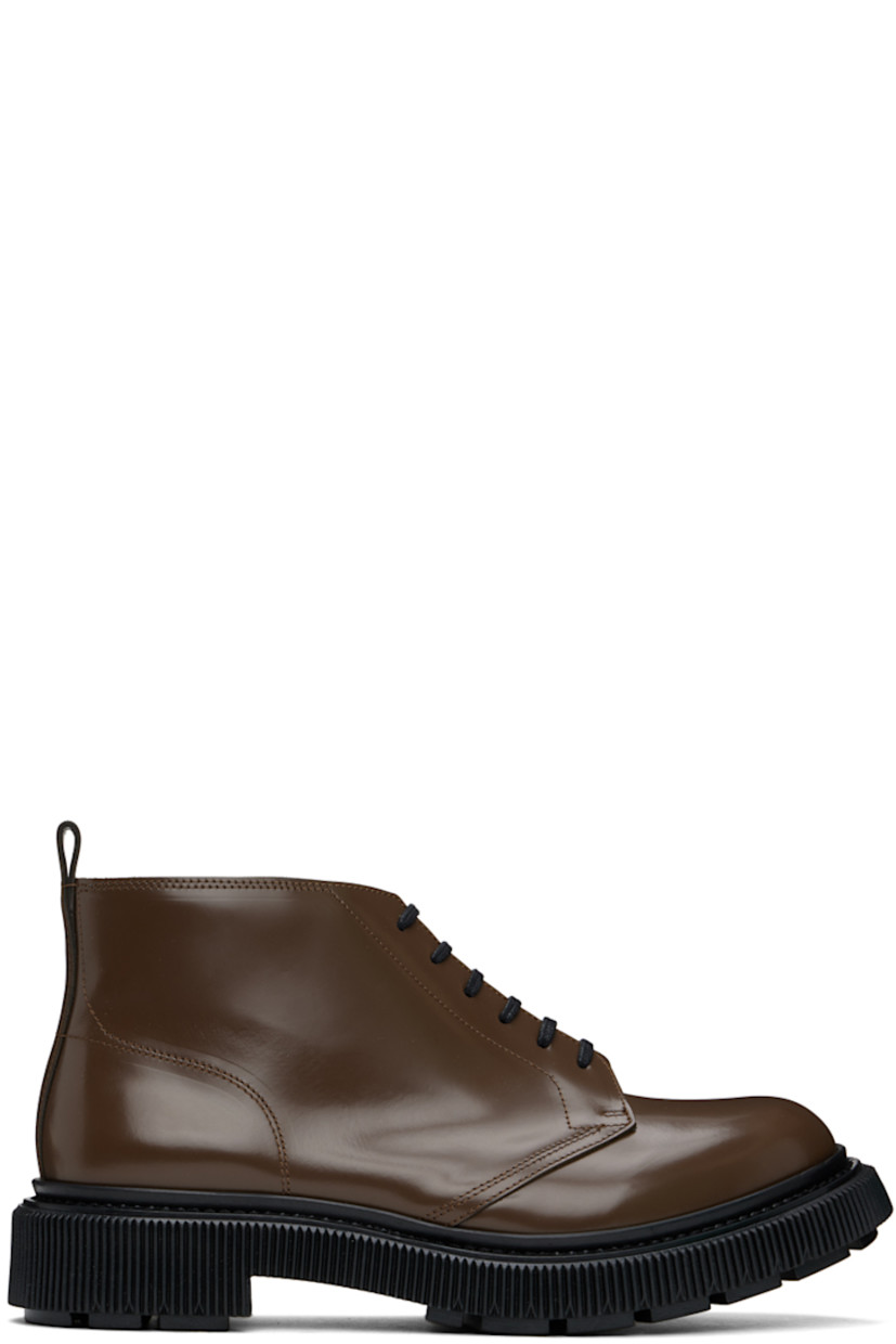 Ankle-high polished leather boots in brown.

· Lace-up closure
· Pull-loop at heel collar
· Suede lining
· Textured rubber midsole
· Treaded rubber sole
· Heel: H1.5" 

Supplier color: Earth