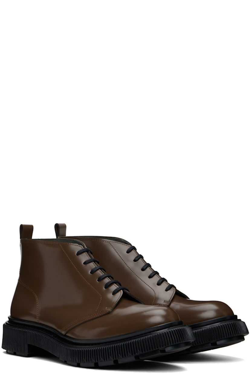 Ankle-high polished leather boots in brown.

· Lace-up closure
· Pull-loop at heel collar
· Suede lining
· Textured rubber midsole
· Treaded rubber sole
· Heel: H1.5" 

Supplier color: Earth