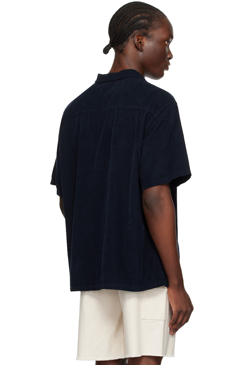 Relaxed-fit cotton corduroy shirt. 

· Open spread collar 
· Button closure
· Patch pocket at chest
· Corozo hardware 

Supplier color: Navy