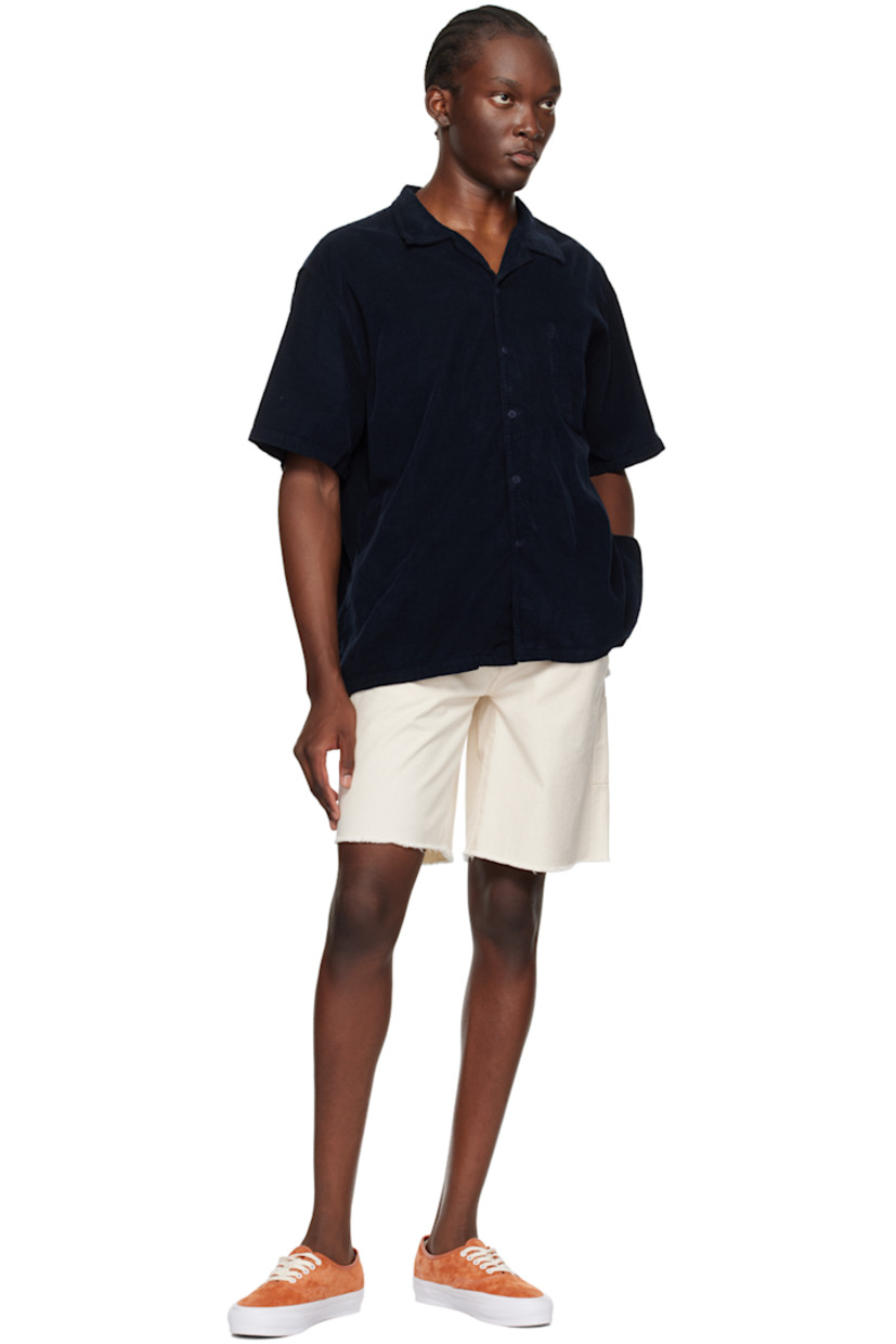 Relaxed-fit cotton corduroy shirt. 

· Open spread collar 
· Button closure
· Patch pocket at chest
· Corozo hardware 

Supplier color: Navy