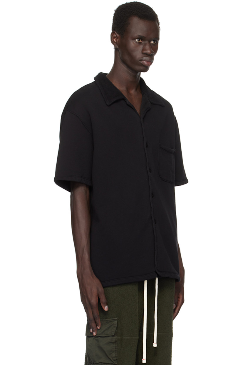 Relaxed-fit heavyweight brushed cotton fleece shirt.

· Pre-shrunk and garment-dyed
· Open spread collar
· Button closure
· Patch pocket
· Dropped shoulders
· Corozo hardware

Supplier color: Jet black