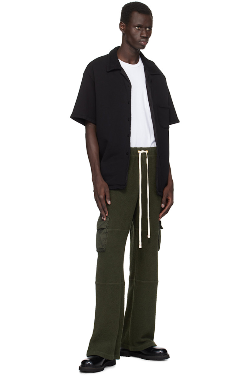 Relaxed-fit heavyweight brushed cotton fleece shirt.

· Pre-shrunk and garment-dyed
· Open spread collar
· Button closure
· Patch pocket
· Dropped shoulders
· Corozo hardware

Supplier color: Jet black
