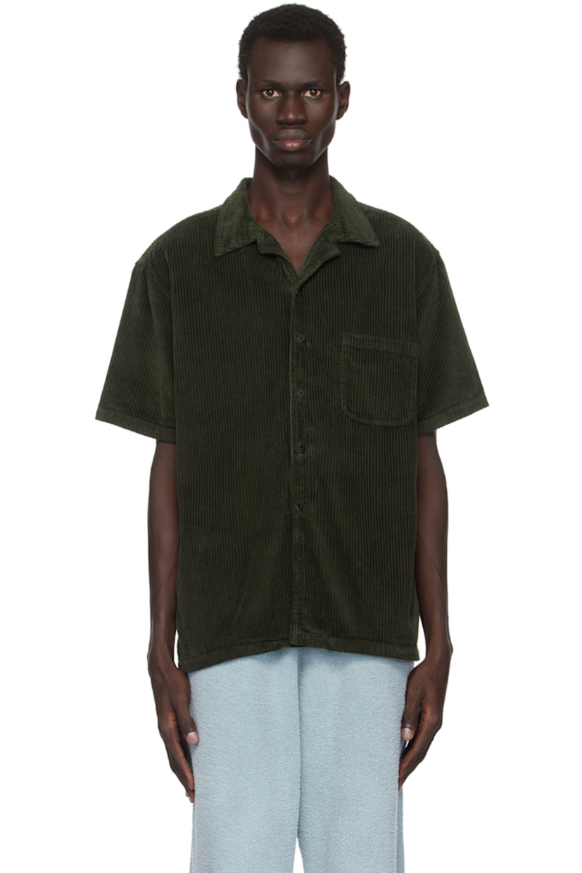 Relaxed-fit wide wale cotton corduroy shirt.

· Open spread collar
· Button closure
· Patch pocket
· Dropped shoulders
· Corozo hardware

Supplier color: Forest
