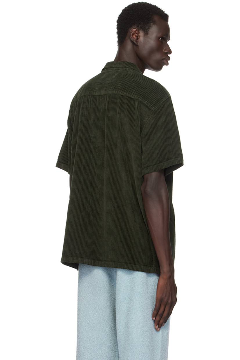 Relaxed-fit wide wale cotton corduroy shirt.

· Open spread collar
· Button closure
· Patch pocket
· Dropped shoulders
· Corozo hardware

Supplier color: Forest