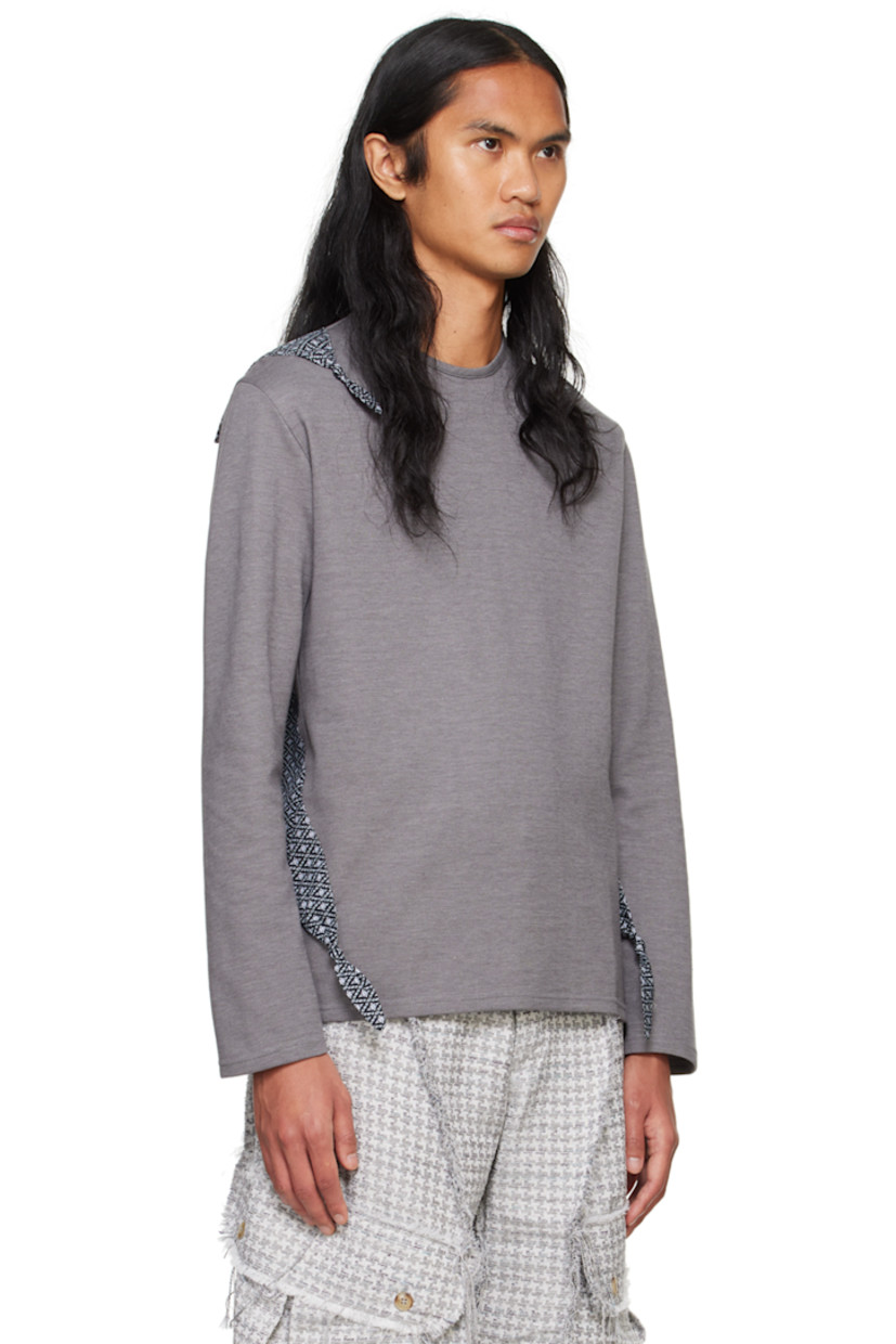 Cotton piqué T-shirt. Patterned canvas flap compartment at back.

· Paneled construction
· Crewneck
· Knotted trim at front 
· Vented side seams

Supplier color: Grey/Black multi