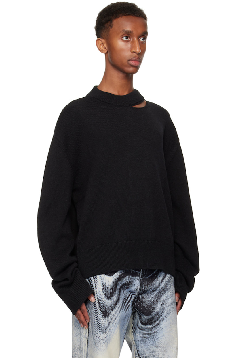 Boxy-fit knit cotton sweater.

· Rib knit crewneck, hem, and cuffs
· Slit at collar

Supplier color: Black