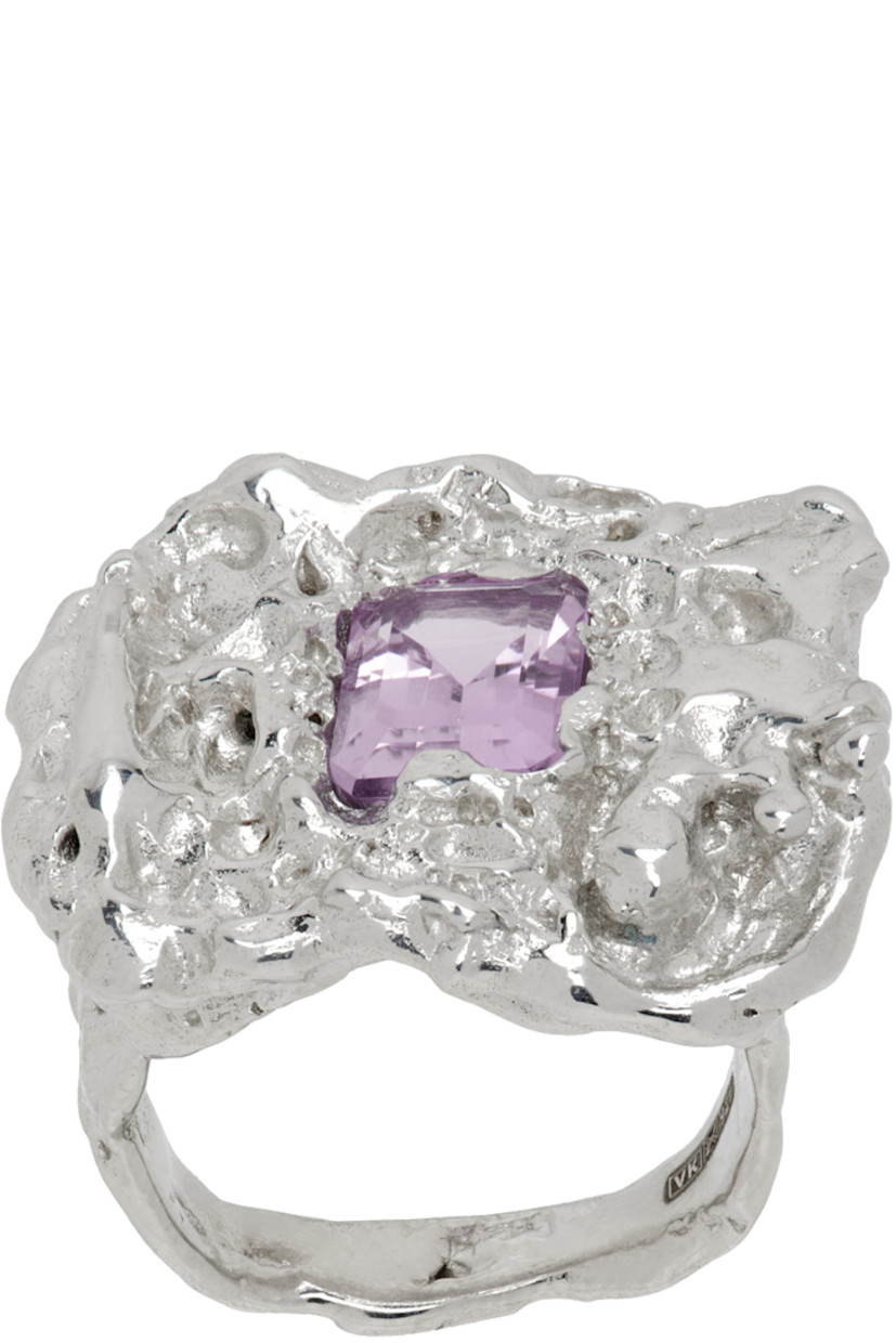 Handcrafted signet ring in platinum-plated recycled sterling silver.

· Textured detailing throughout
· Bezel-set and emerald-cut 1.39 ct amethyst at face
· Full hallmarking

Supplier color: Silver/Amethyst