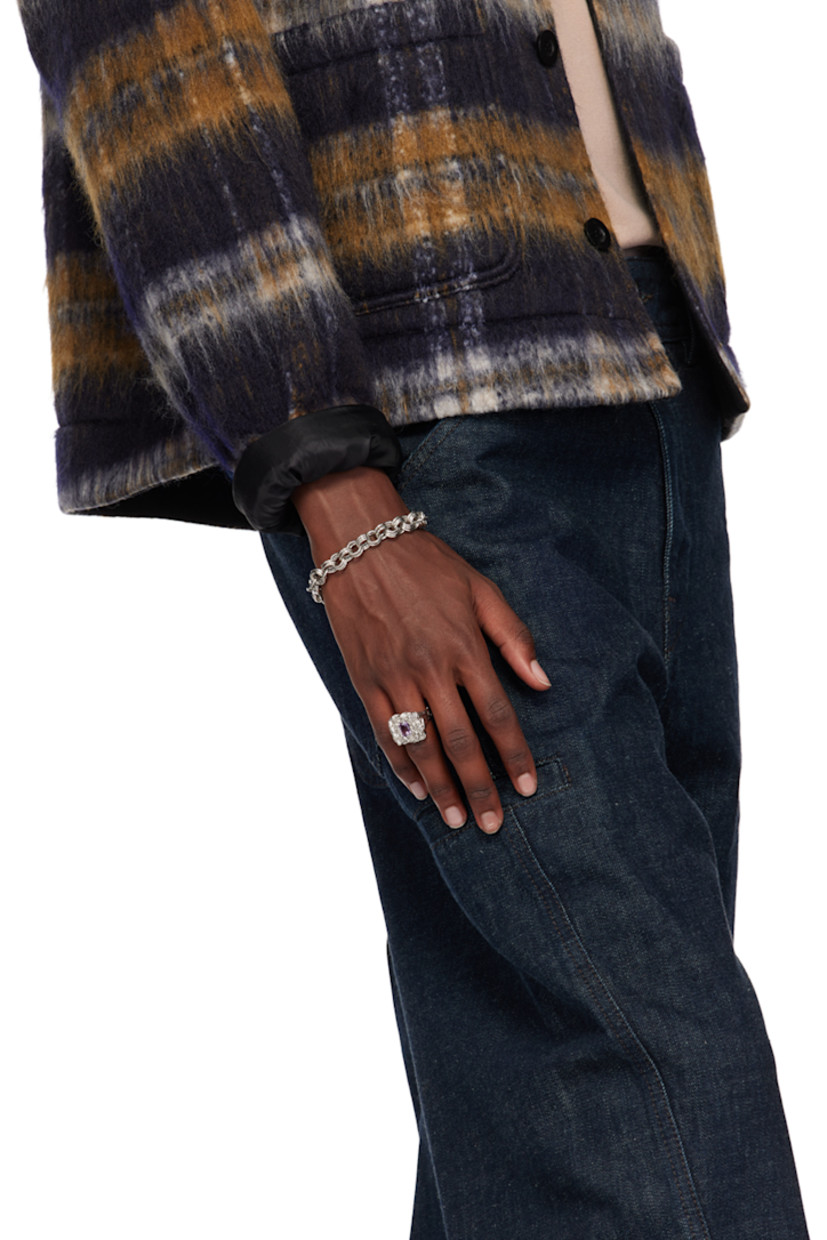 Handcrafted signet ring in platinum-plated recycled sterling silver.

· Textured detailing throughout
· Bezel-set and emerald-cut 1.39 ct amethyst at face
· Full hallmarking

Supplier color: Silver/Amethyst