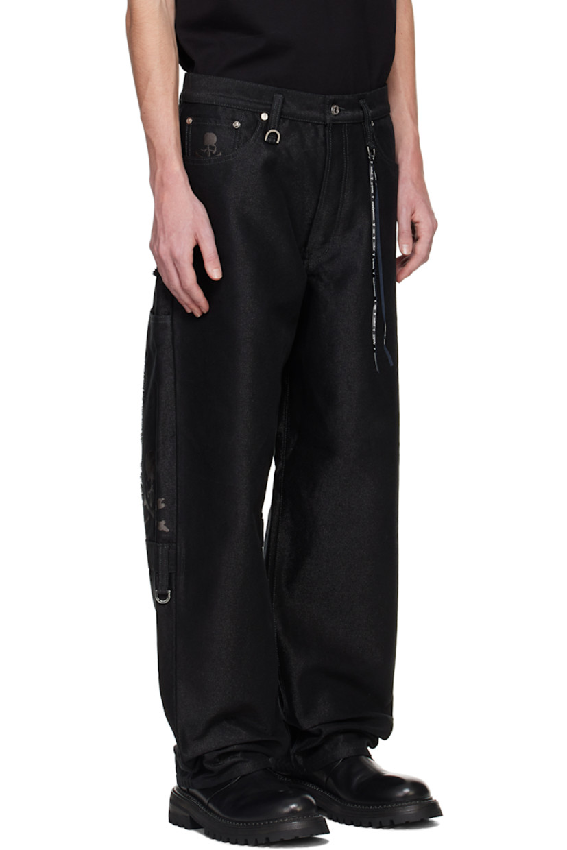 Coated non-stretch cotton-blend denim jeans. D-rings and frayed edges throughout.

· Belt loops
· Five-pocket styling
· Button-fly
· Detachable logo-printed trim at waistband
· Logo embroidered at coin pocket
· Logo flag at outseam
· Patch pocket at outseams
· Logo patch at back waistband
· Logo embroidered at back legs

Supplier color: Black
