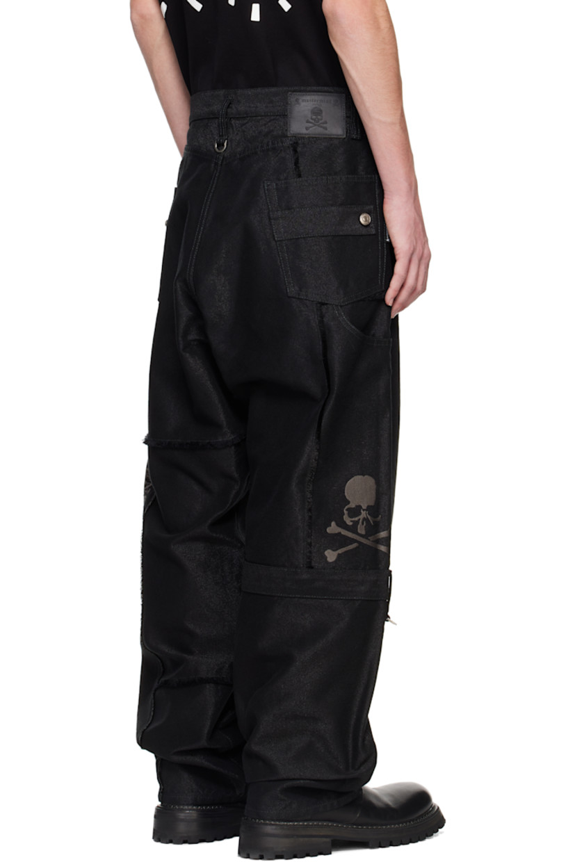 Coated non-stretch cotton-blend denim jeans. D-rings and frayed edges throughout.

· Belt loops
· Five-pocket styling
· Button-fly
· Detachable logo-printed trim at waistband
· Logo embroidered at coin pocket
· Logo flag at outseam
· Patch pocket at outseams
· Logo patch at back waistband
· Logo embroidered at back legs

Supplier color: Black