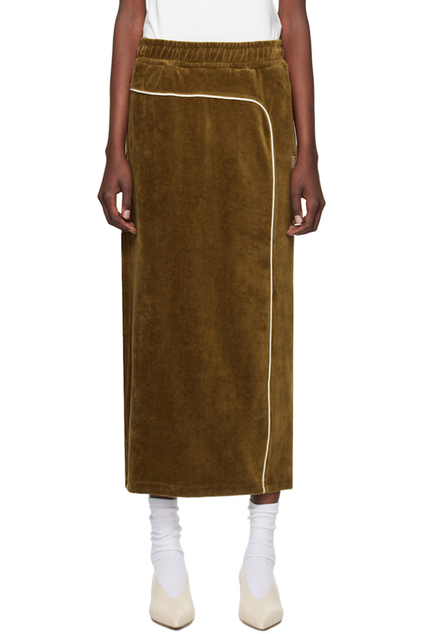 Cotton- and modal-blend velour skirt. Piping throughout. 

· Drawstring at elasticized waistband 
· Four-pocket styling
· Logo embroidered at front
· Central vent at back hem
· Unlined

Supplier color: Brown