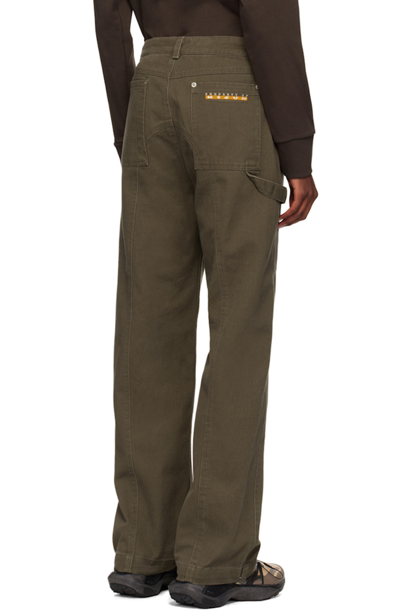 Cotton twill trousers. 

· Paneled construction
· Belt loops
· Four-pocket styling
· Zip-fly
· Embroidered logo patch at outseam
· Hammer loop at outseam
· Logo embroidered at back pocket

Supplier color: Dark brown