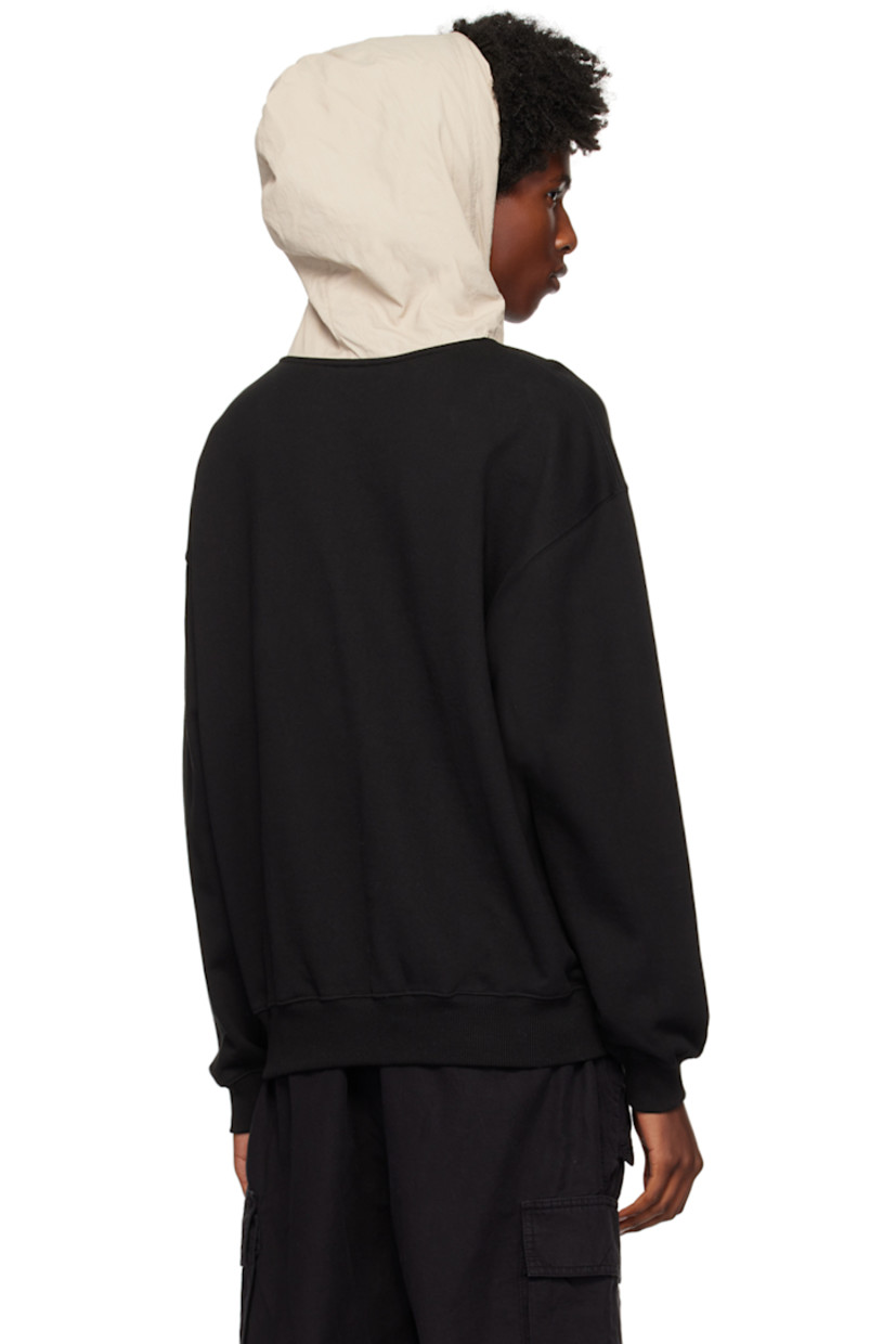 French terry hoodie.

· Drawstring and press-stud fastening at taffeta hood
· Logo embroidered at chest
· Kangaroo pocket
· Rib knit hem and cuffs
· Dropped shoulders

Supplier color: Black/Beige