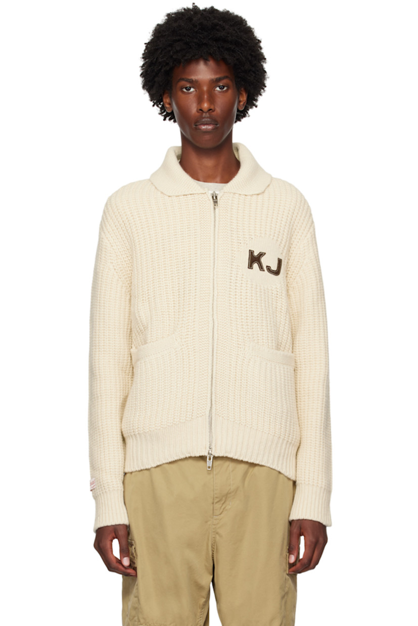 Rib knit wool- and nylon-blend cardigan.

· Shawl collar
· Two-way zip closure
· Logo embroidered at chest
· Welt pockets
· Logo patch at cuff
· Text and logo patch at back 
· Silver-tone hardware

Supplier color: Ivory