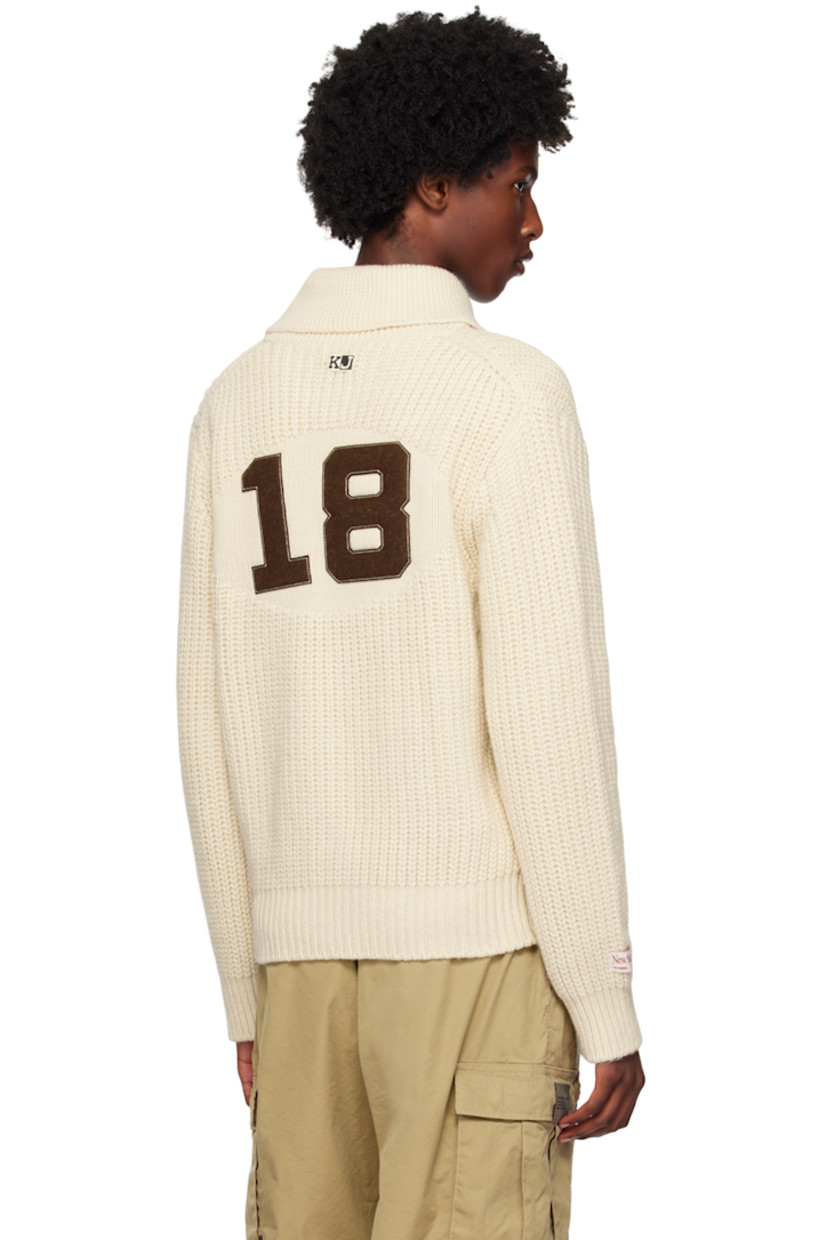 Rib knit wool- and nylon-blend cardigan.

· Shawl collar
· Two-way zip closure
· Logo embroidered at chest
· Welt pockets
· Logo patch at cuff
· Text and logo patch at back 
· Silver-tone hardware

Supplier color: Ivory