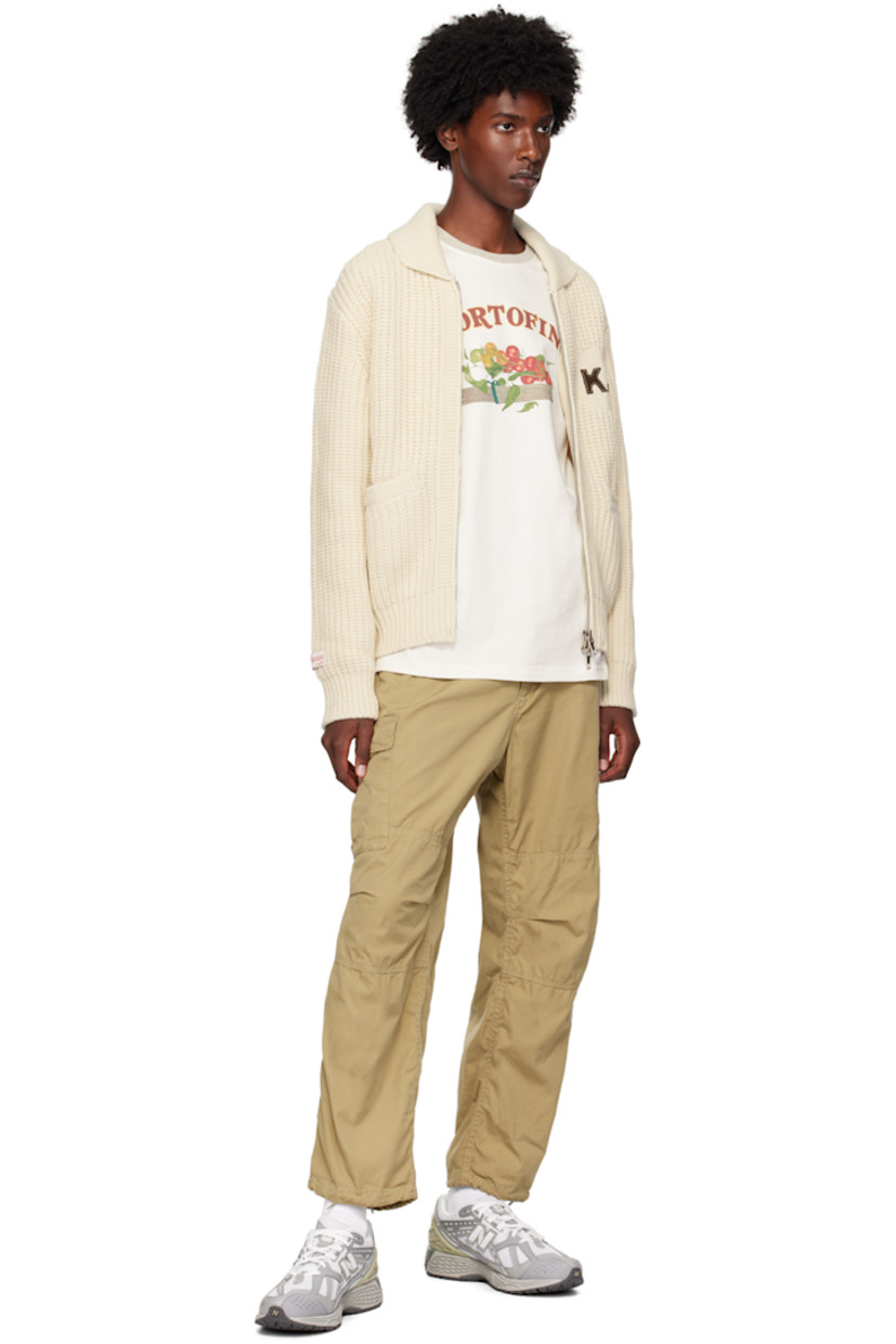Rib knit wool- and nylon-blend cardigan.

· Shawl collar
· Two-way zip closure
· Logo embroidered at chest
· Welt pockets
· Logo patch at cuff
· Text and logo patch at back 
· Silver-tone hardware

Supplier color: Ivory