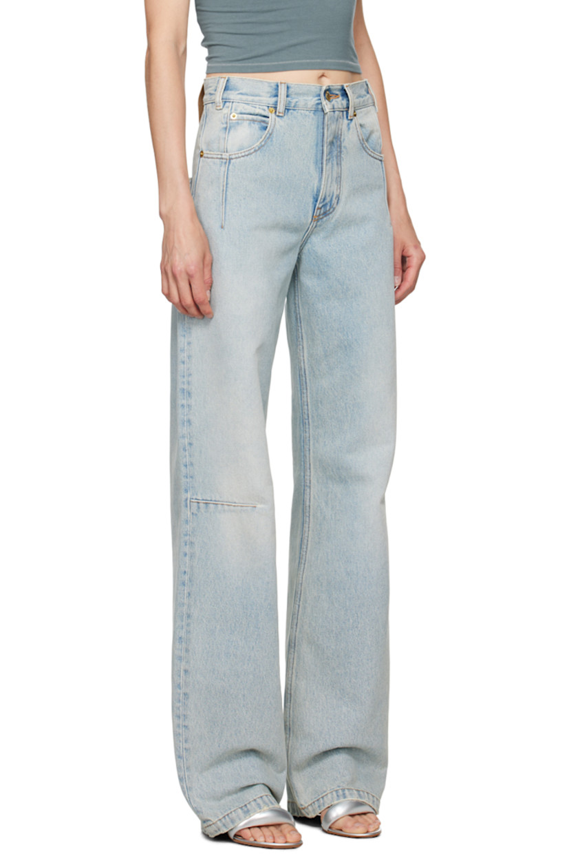 Straight-leg non-stretch denim jeans. Fading, subtle distressing, and darts throughout.

· High-rise
· Belt loops
· Five-pocket styling
· Zip-fly
· Leather logo patch at back waistband
· Logo-engraved gold-tone hardware
· Contrast stitching in tan

Supplier color: Lil light