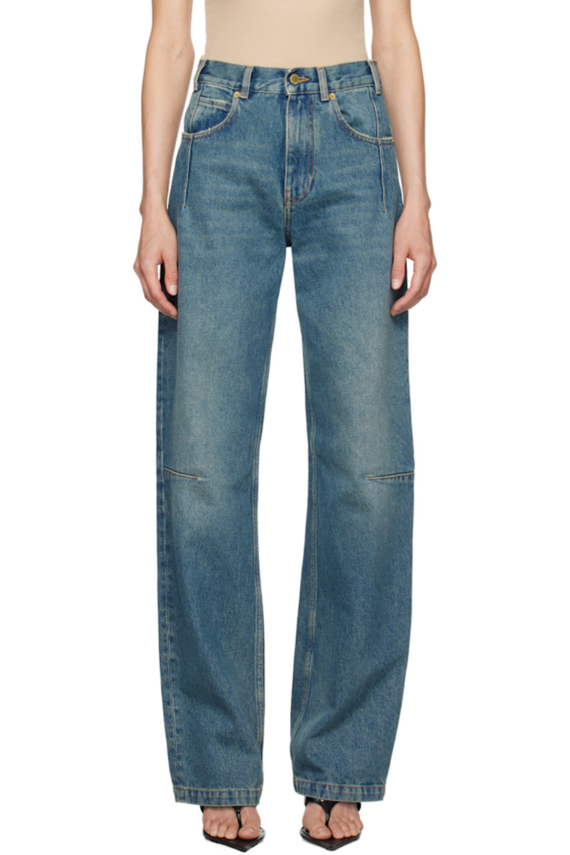 Straight-leg non-stretch denim jeans. Fading throughout. 

· High-rise
· Belt loops
· Five-pocket styling
· Zip-fly
· Darts at legs 
· Logo patch at back waistband
· Contrast stitching in tan
· Logo-engraved gold-tone hardware

Supplier color: Sand wash
