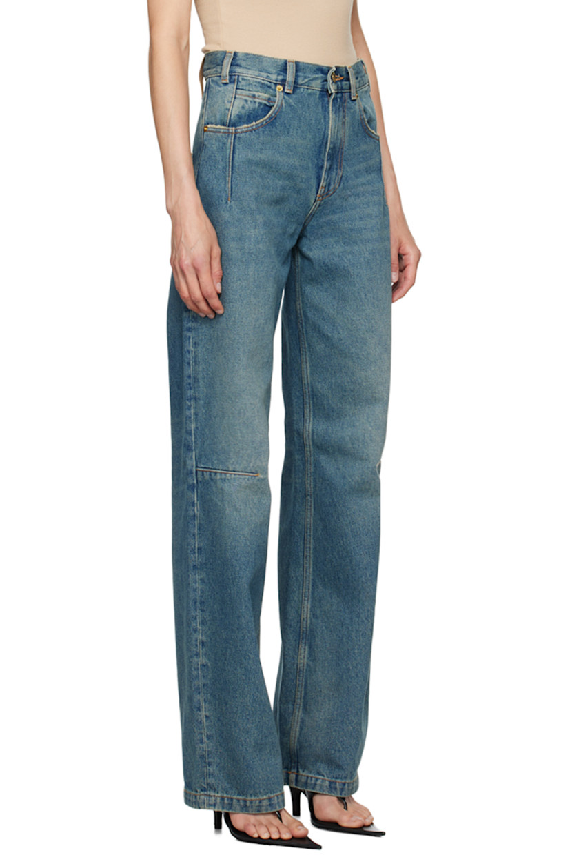 Straight-leg non-stretch denim jeans. Fading throughout. 

· High-rise
· Belt loops
· Five-pocket styling
· Zip-fly
· Darts at legs 
· Logo patch at back waistband
· Contrast stitching in tan
· Logo-engraved gold-tone hardware

Supplier color: Sand wash