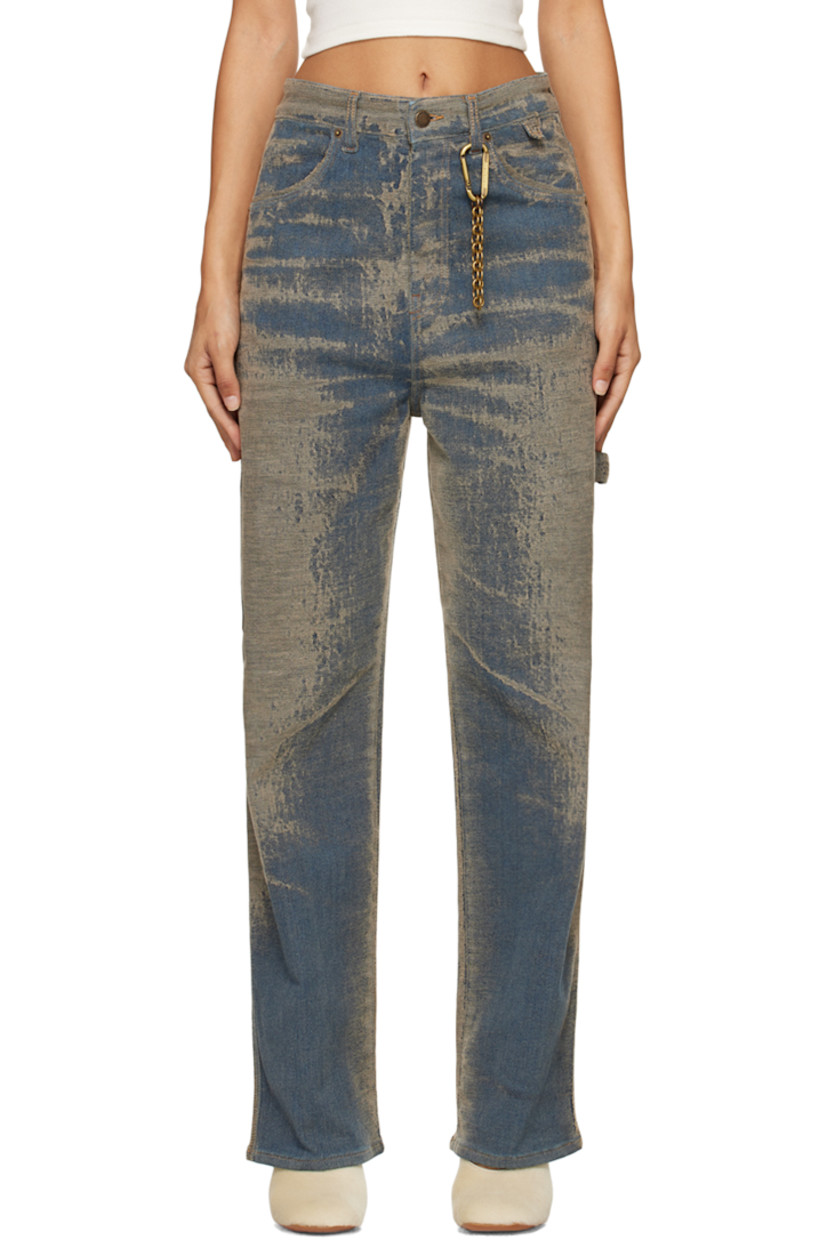 Stretch denim jeans. Jacquard pattern throughout. 

· Belt loops
· Carabiner with chain at belt loop 
· Four-pocket styling
· Zip-fly
· Patch pocket at outseam
· Hammer loop at outseam
· Leather logo patch at back waistband
· Logo-engraved brass-tone hardware
· Contrast stitching in tan

Supplier color: Faded sand wash